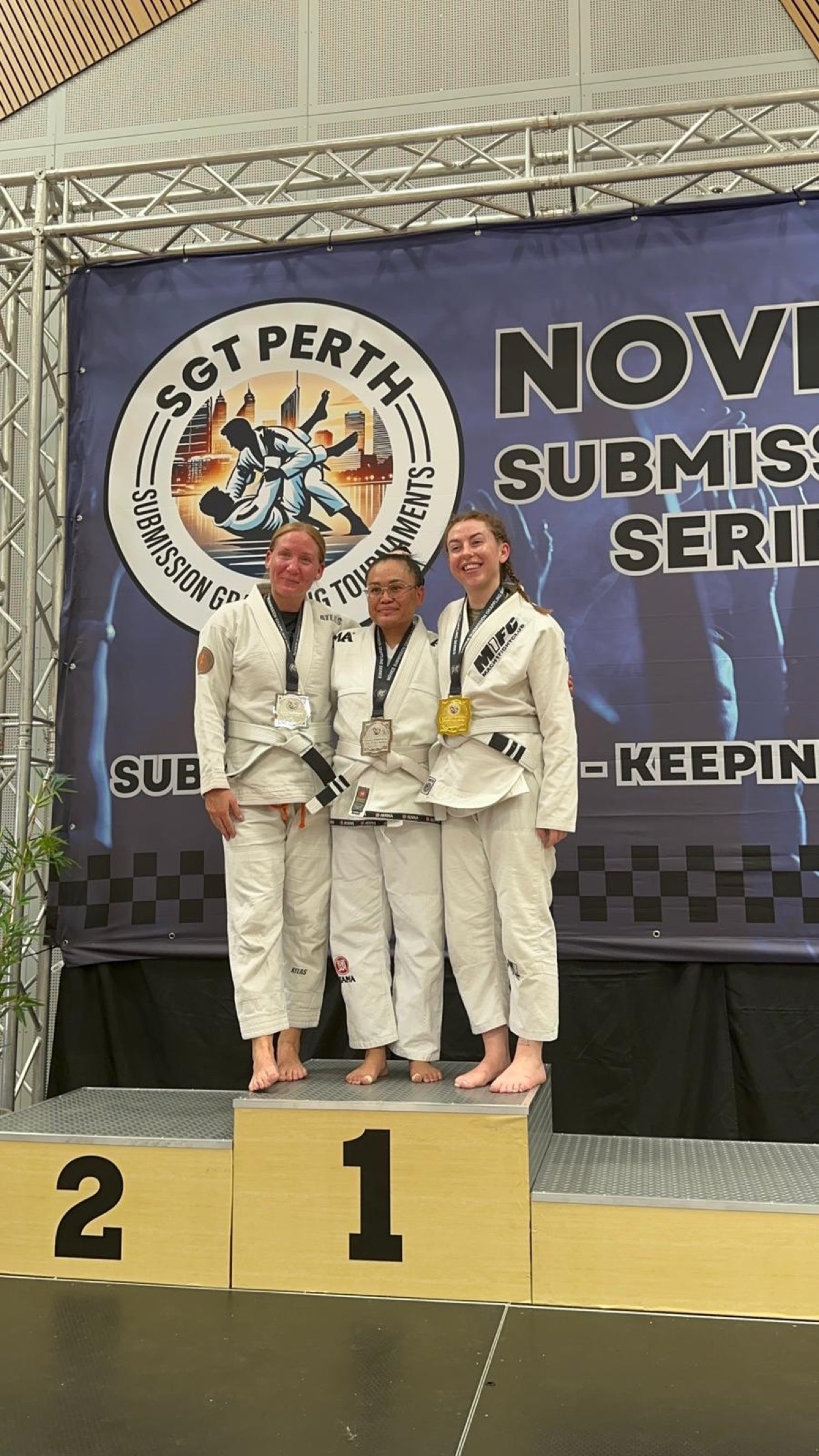 FJJ women's team with competition medals